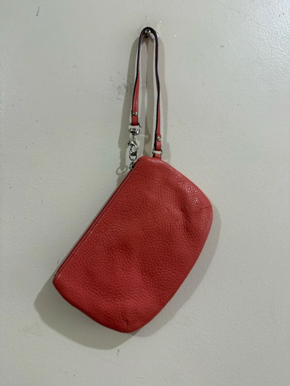 Coach Coral Pebbled Leather Wristlet with Turnlock Accent